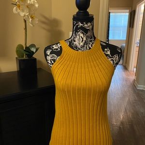 Beautiful mustard yellow sleeveless sweater top. Fall favorite!